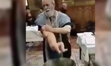 Βίντεο - ΣΟΚ: Έξαλλος ιερέας παραλίγο να πνίξει το μωρό που βάφτιζε!